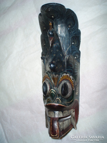 Old tribal mask wood carving