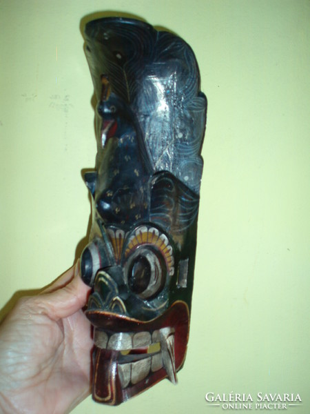 Old tribal mask wood carving