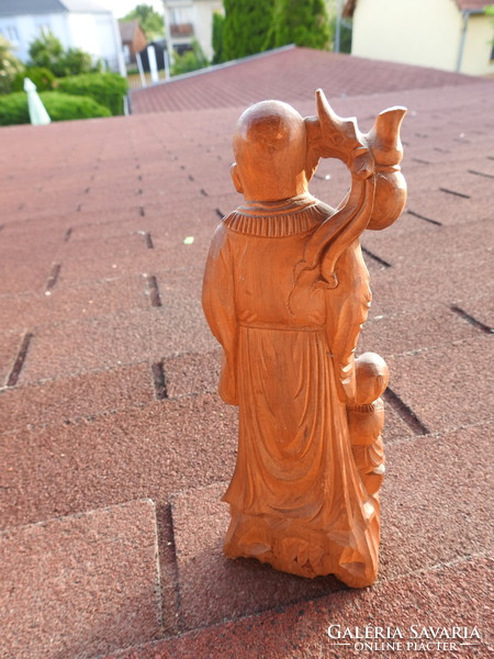 Eastern wood carving - holy man with a little boy
