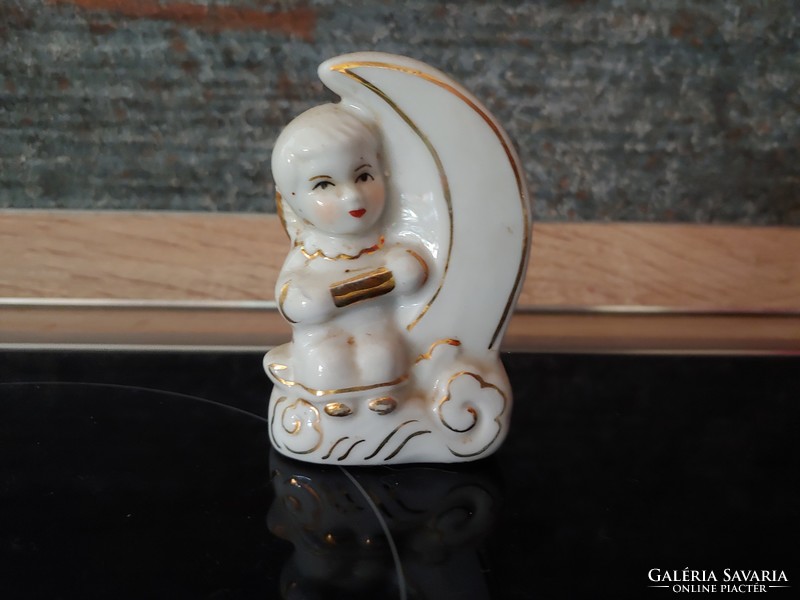 Little girl sitting on moon porcelain rarity
