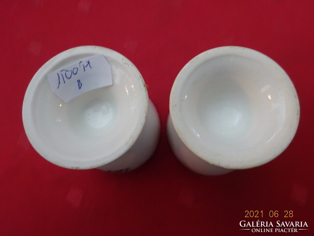 German porcelain egg holder with guten appetite inscription and red stripe on the bottom. He has!