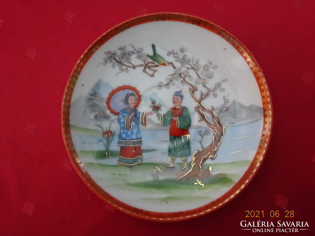 Japanese porcelain teacup coaster with a picture depicting a scene, diameter 14.5 cm. He has!