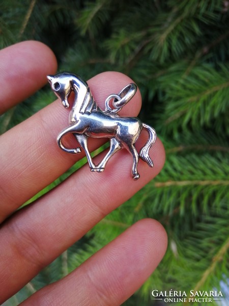 Silver horse, riding pendant