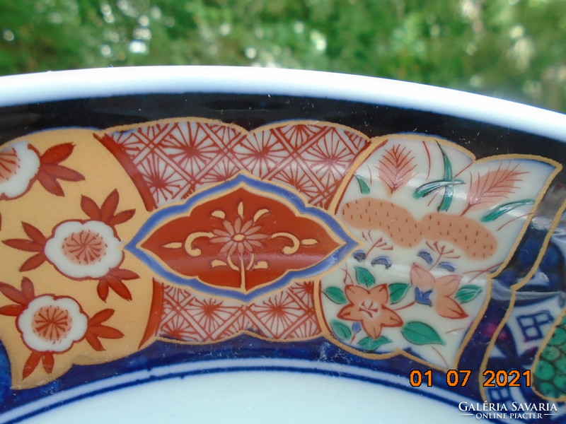 Antique Chinese hand painted bowl with 7 hand writing marks