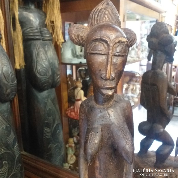 Rare old West African Ivory Coast fertility wooden statue, wooden carving figure. Collector's item.
