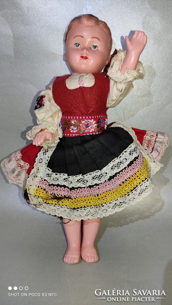 Antique old folk costume doll