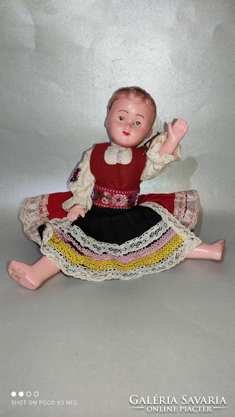 Antique old folk costume doll