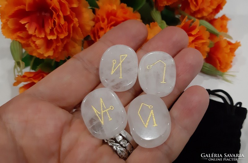 The sigils of the four archangels are engraved in white quartz in an elegant setting, topaaa