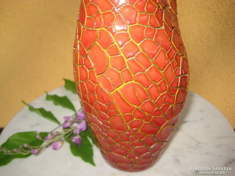 Small professional repair on the mouth of Zsolnay's cracked, oxblood-glazed vase with ears