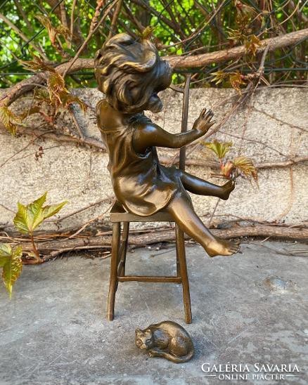 Little girl playing with a cat - bronze sculpture works of art