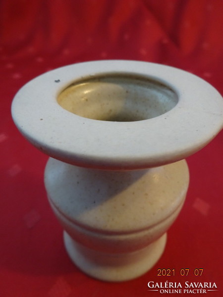 Glazed ceramic candle holder, height 8 cm. He has!