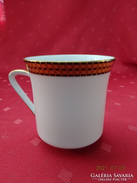 Thomas German porcelain coffee cup with gold border. He has!