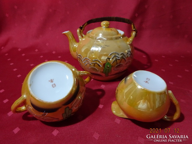 Japanese porcelain teapot, sugar bowl and milk spout. He has!