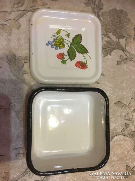 Enameled, strawberry-patterned food container with a lid
