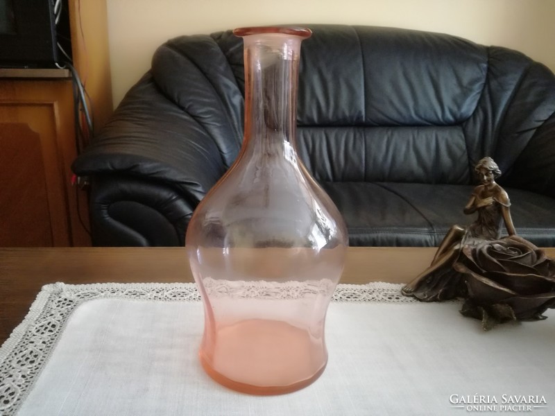 Old pink, salmon-colored glass, vase