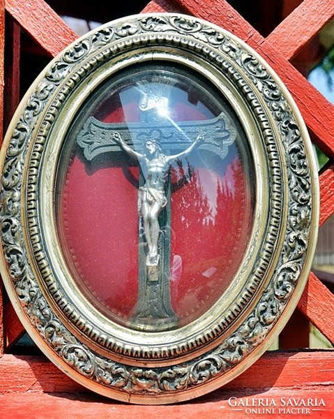 Arc. Napoleon. Antique, silver and silver-plated christ, body in a gilded oval frame with convex glass