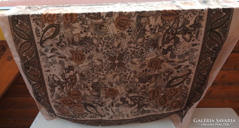 Old brown scarf with rose pattern