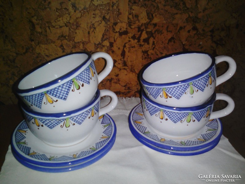 4 teacups with mug base