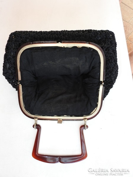 Antique black casual bag with vinyl handles