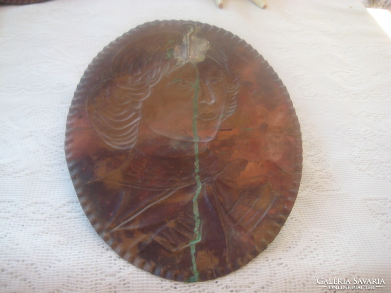 Retro, goldsmith's work, mural on a red copper base. Embossed image of a young lady 16.5 x 21 mm