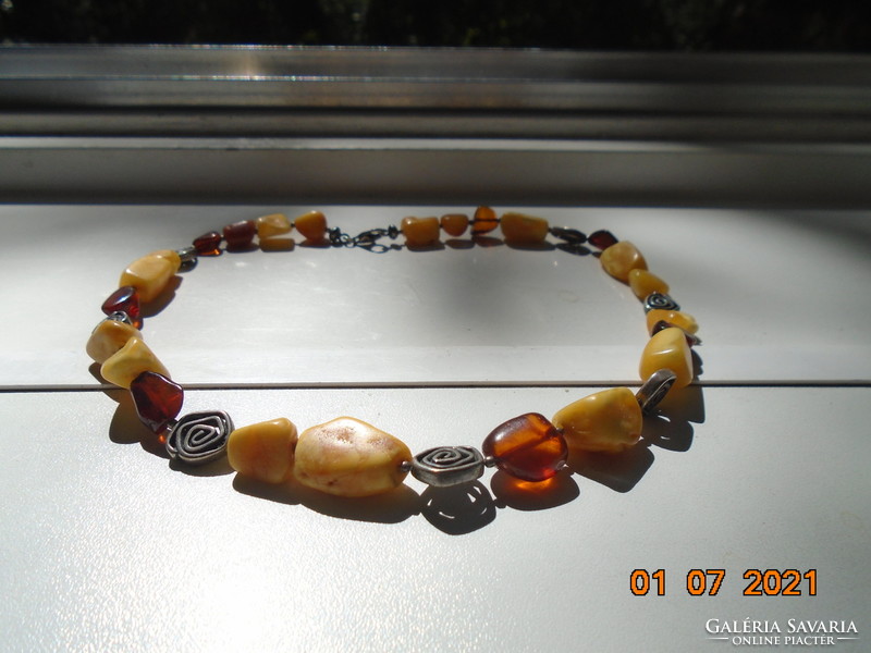 Necklace made of three types of amber and silver spiral disk beads