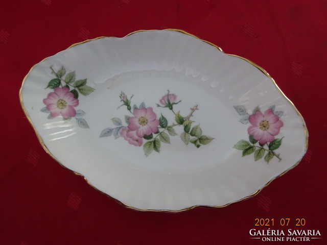 English porcelain centerpiece with pink flower and gold border. There are some!
