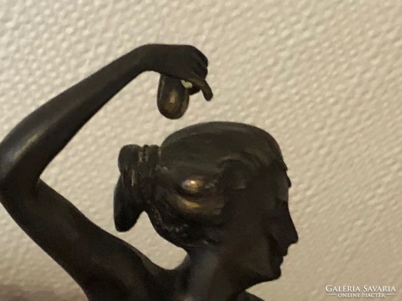 Antique bronze dancing girl on pedestal