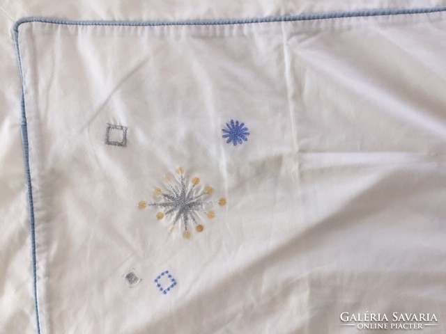 2 white pillowcases with embroidered stars