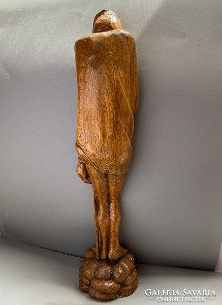 Carved wooden mephisto statue by Jacques Louis Gautier.