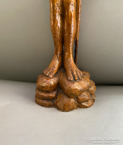 Carved wooden mephisto statue by Jacques Louis Gautier.