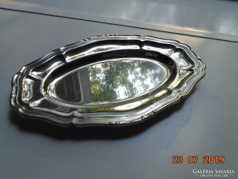 Baroque oval chromed metal tray with embossed rim