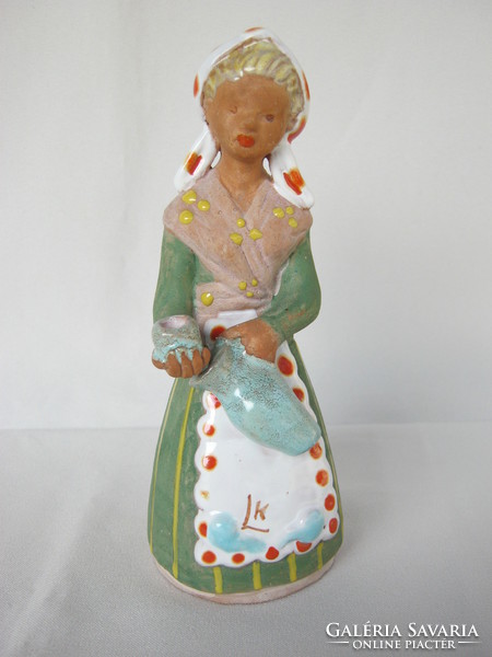 L. K. Ceramic girl with markings