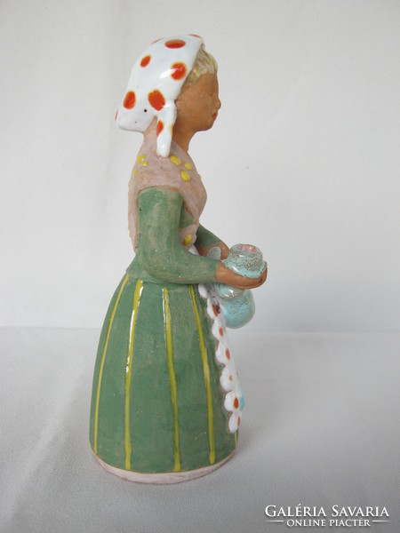 L. K. Ceramic girl with markings