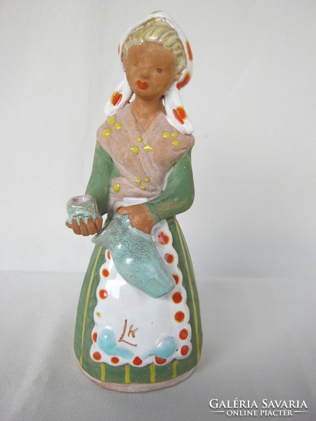 L. K. Ceramic girl with markings