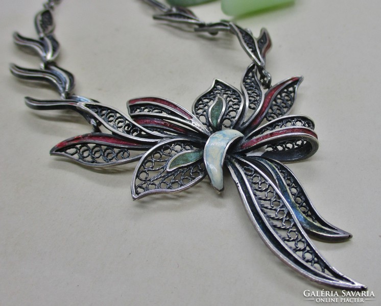 Beautiful old handmade silver necklaces with enameled floral decorations