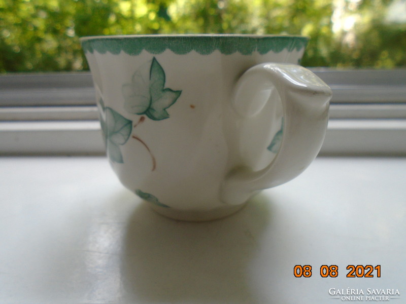 Ribbed English tea cup with an ivy leaf pattern