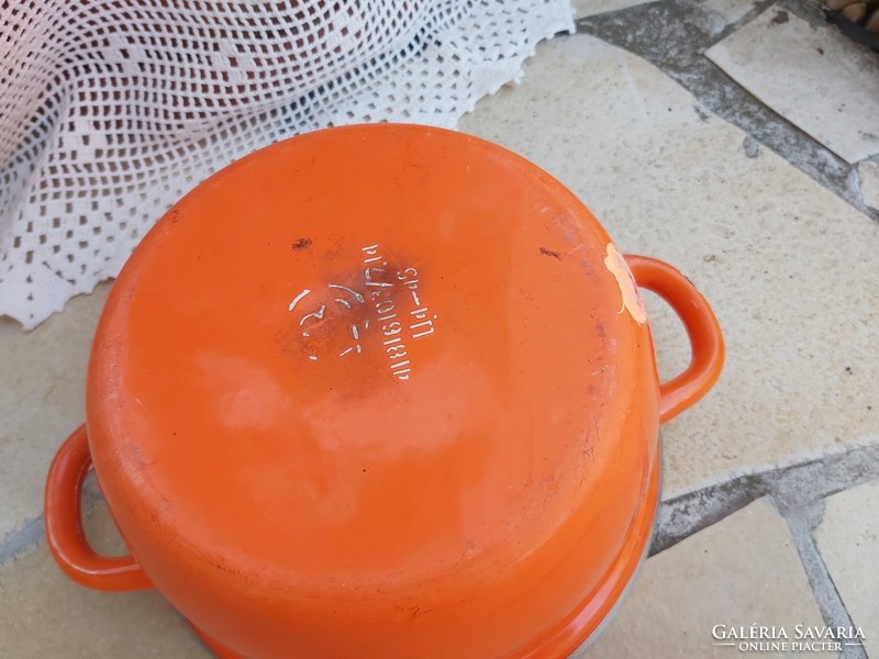 Beautiful yellow orange polka dot enamel bowl in a peasant bowl, like a peasant pot