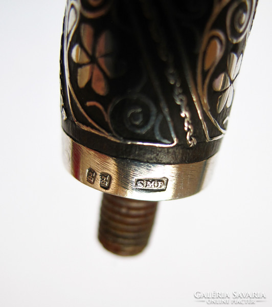 Silver inlaid old mouthpiece.