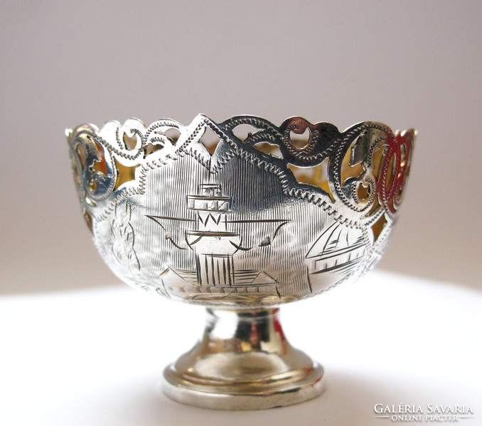 Ornate Turkish silver coffee cup holders.