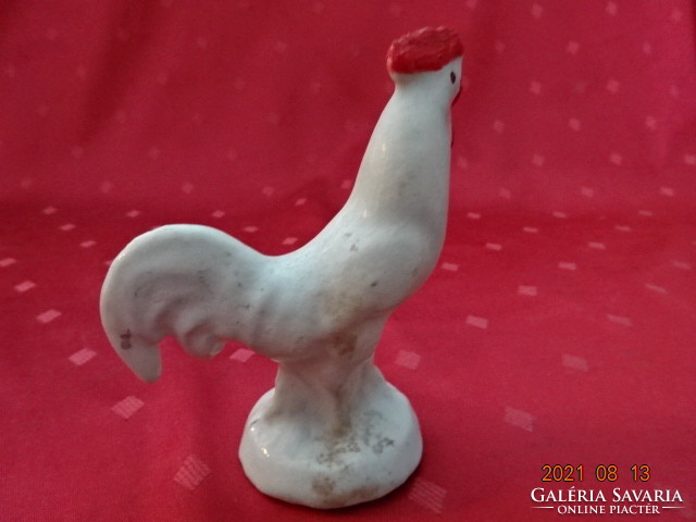 Aluminum rooster with plastic coating, height 11 cm. He has!