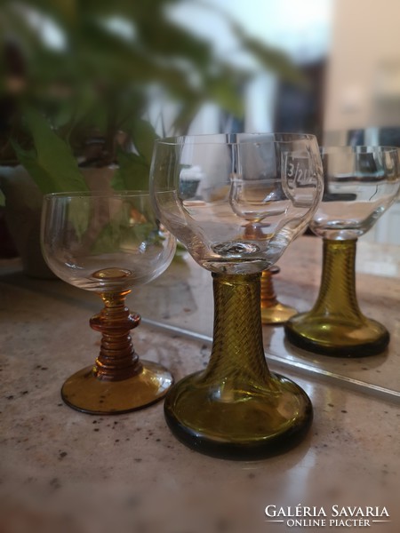 Crystal, amber-colored, handmade wine glasses with stems