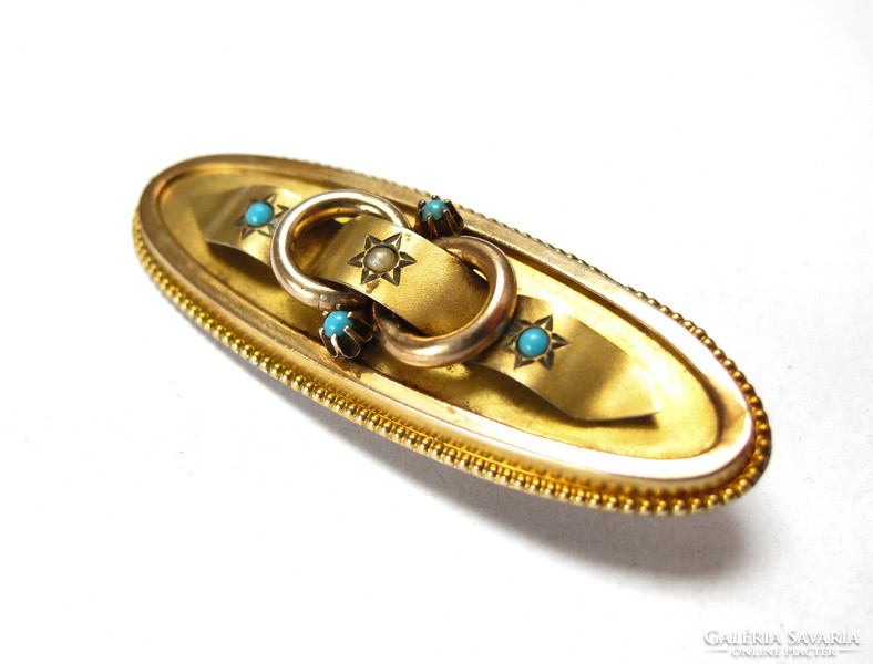 Antique gilded silver brooch with turquoise.