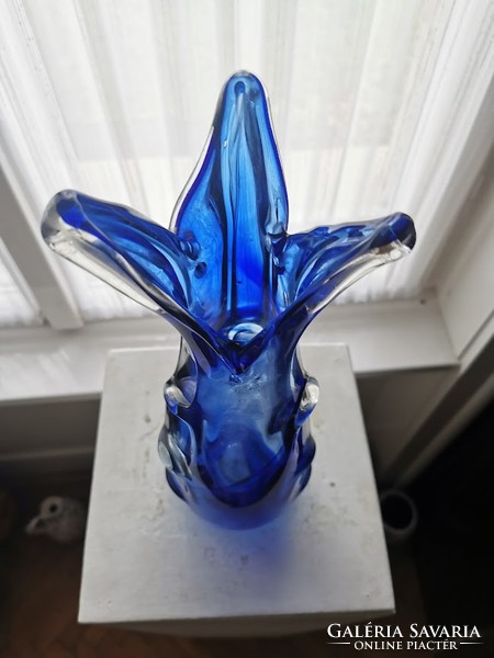 Blue glass vase, broken glass