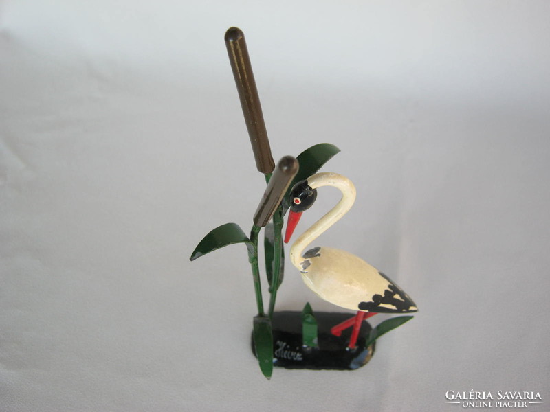 Retro heat water memorial metal stork