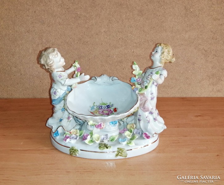 Antique porcelain figures offering ring holders or bonbons