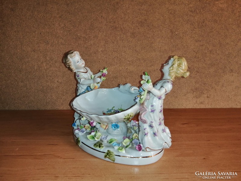 Antique porcelain figures offering ring holders or bonbons