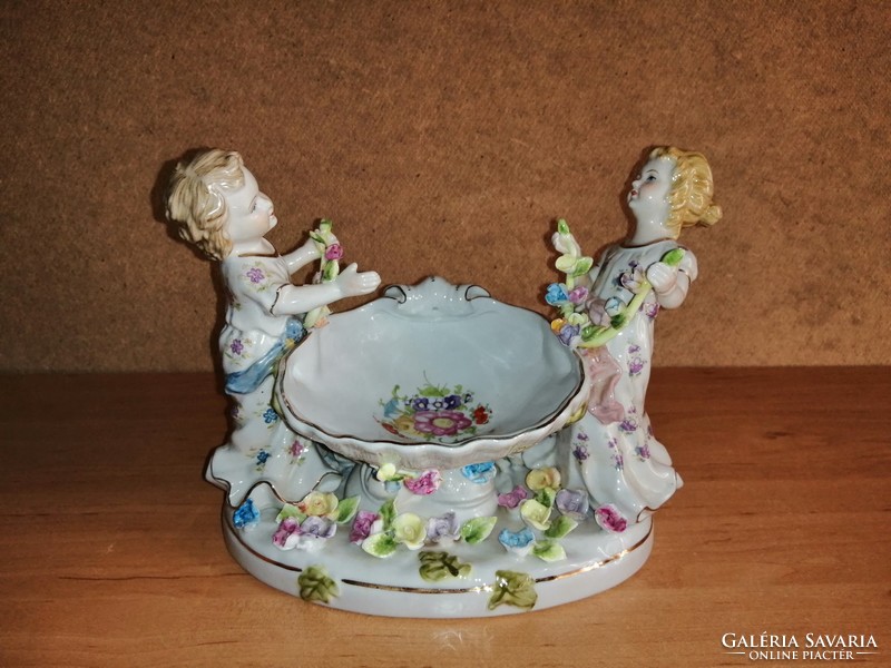 Antique porcelain figures offering ring holders or bonbons