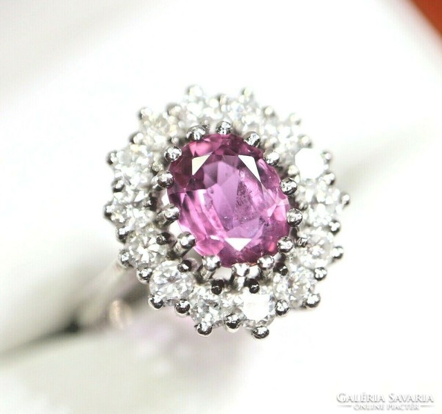 Gold ring with 0.70 Ct diamond and pink tourmaline. With certificate