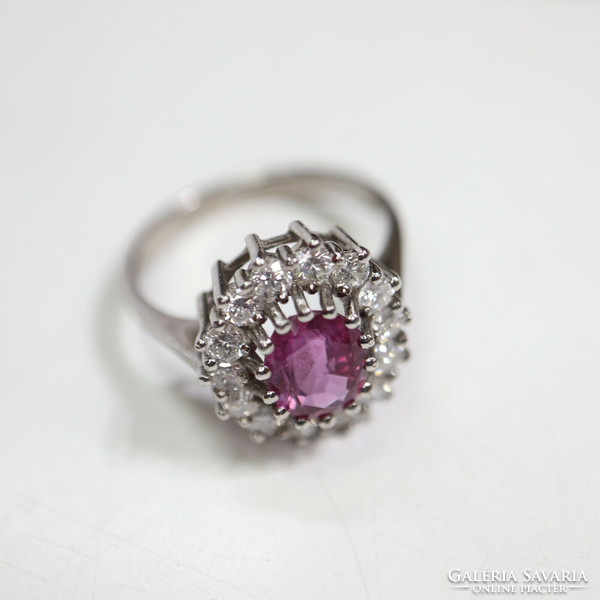 Gold ring with 0.70 Ct diamond and pink tourmaline. With certificate