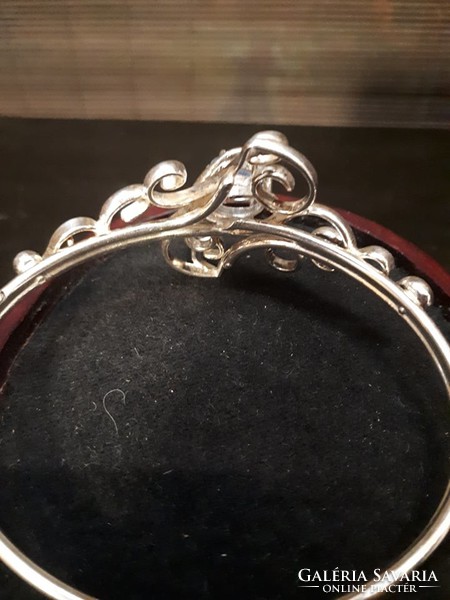 Silver bracelet decorated with aquamarine and zircon stone